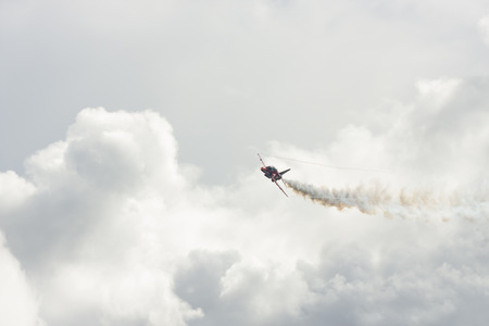 Tallinn, Estonia - June 23, 2014  Red Arrow aerobatic flight show with red fighter jets in Tallinn, Estonia on June 23, 2014のeditorial素材