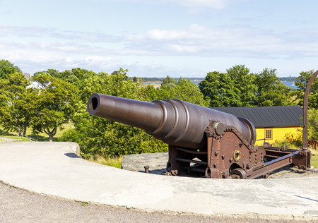 Old cannon in Suomenlinna fortress area in Helsinki, Finlandの写真素材
