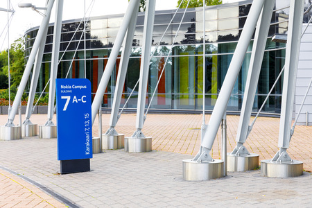 HELSINKI, FINLAND - SEPTEMBER 16, 2017: Nokia brand name on a blue sign in Nokia Campus near Helsinki, Finland on September 16, 2017のeditorial素材