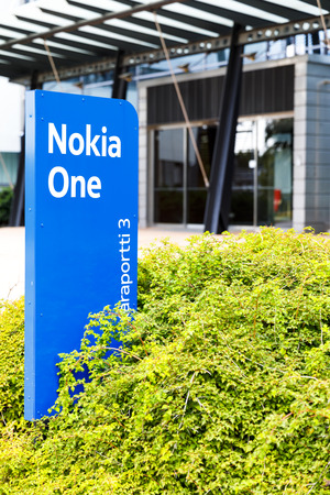 HELSINKI, FINLAND - SEPTEMBER 16, 2017: Nokia brand name on a blue sign in Nokia Campus near Helsinki, Finland on September 16, 2017のeditorial素材