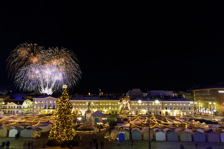 HELSINKI, FINLAND - 06 DECEMBER, 2017: Independence day fireworks above christmas market in Helsinki, Finland on December 06, 2017のeditorial素材