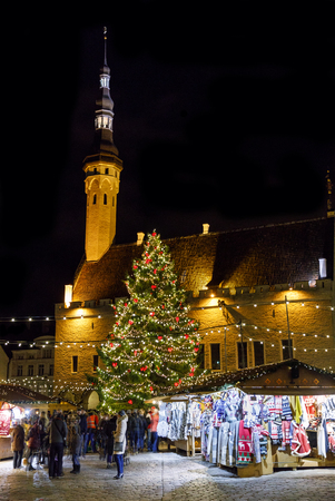 TALLINN, ESTONIA - DECEMBER 24, 2017: Tourists at Christmas market in Tallinn old town in Estonia on December 24, 2017のeditorial素材