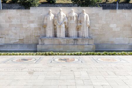 Four man sculptures at Reformation wall in Parc Des Bastions, Geneva, Switzerlandの写真素材
