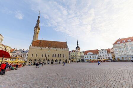 TALLINN, ESTONIA - APRIL 22, 2019: Few people walk on large town hall square in the old town of Tallinn, Estonia in April 2019のeditorial素材