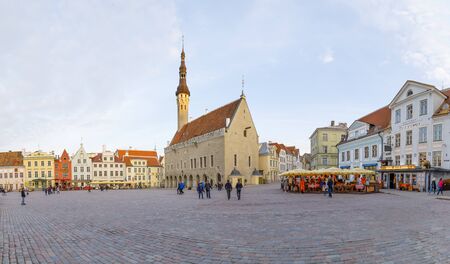 TALLINN, ESTONIA - APRIL 22, 2019: Few people walk on large town hall square in the old town of Tallinn, Estonia in April 2019のeditorial素材