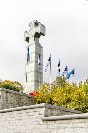 TALLINN, ESTONIA - OCTOBER 05, 2019: Glass made statue of liberty and colorful trees in autumn in Tallinn, Estonia in October 2019のeditorial素材