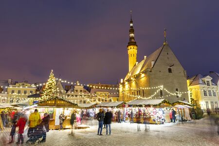 TALLINN, ESTONIA - DECEMBER 22, 2018: People visit christmas market in the old town of Tallinn, capital of Estonia on December 22, 2018のeditorial素材