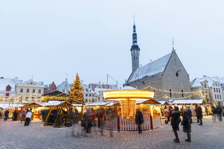TALLINN, ESTONIA - DECEMBER 22, 2018: People visit christmas market in the old town of Tallinn, capital of Estonia on December 22, 2018のeditorial素材