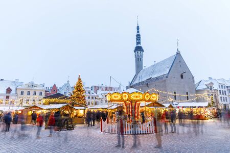 TALLINN, ESTONIA - DECEMBER 22, 2018: People visit christmas market in the old town of Tallinn, capital of Estonia on December 22, 2018のeditorial素材