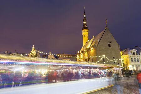 TALLINN, ESTONIA - DECEMBER 22, 2018: People visit christmas market in the old town of Tallinn, capital of Estonia on December 22, 2018のeditorial素材