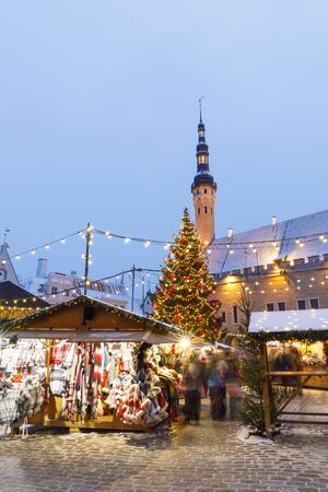 TALLINN, ESTONIA - DECEMBER 22, 2018: People visit christmas market in the old town of Tallinn, capital of Estonia on December 22, 2018のeditorial素材