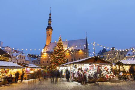 TALLINN, ESTONIA - DECEMBER 22, 2018: People visit christmas market in the old town of Tallinn, capital of Estonia on December 22, 2018のeditorial素材