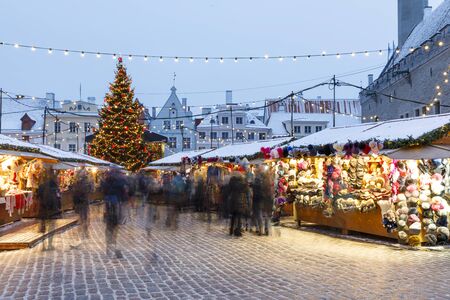 TALLINN, ESTONIA - DECEMBER 22, 2018: People visit christmas market in the old town of Tallinn, capital of Estonia on December 22, 2018のeditorial素材