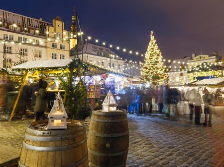 TALLINN, ESTONIA - DECEMBER 22, 2018: People visit christmas market in the old town of Tallinn, capital of Estonia on December 22, 2018のeditorial素材