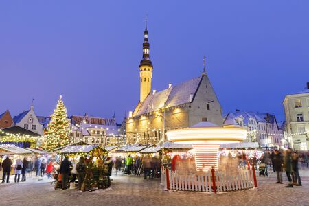 TALLINN, ESTONIA - DECEMBER 22, 2018: People visit christmas market in the old town of Tallinn, capital of Estonia on December 22, 2018のeditorial素材