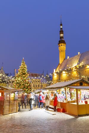 TALLINN, ESTONIA - DECEMBER 22, 2018: People visit christmas market in the old town of Tallinn, capital of Estonia on December 22, 2018のeditorial素材