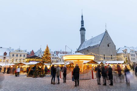 TALLINN, ESTONIA - DECEMBER 22, 2018: People visit christmas market in the old town of Tallinn, capital of Estonia on December 22, 2018のeditorial素材