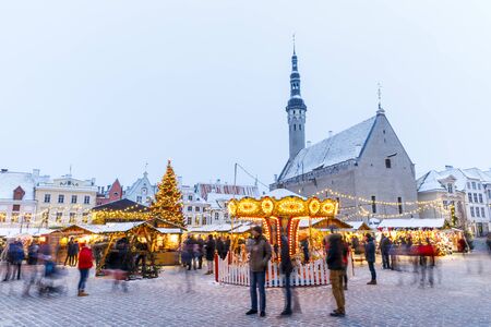 TALLINN, ESTONIA - DECEMBER 22, 2018: People visit christmas market in the old town of Tallinn, capital of Estonia on December 22, 2018のeditorial素材