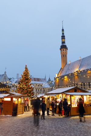 TALLINN, ESTONIA - DECEMBER 22, 2018: People visit christmas market in the old town of Tallinn, capital of Estonia on December 22, 2018のeditorial素材