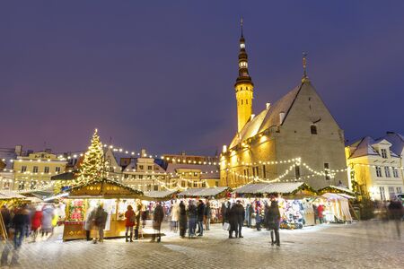 TALLINN, ESTONIA - DECEMBER 22, 2018: People visit christmas market in the old town of Tallinn, capital of Estonia on December 22, 2018のeditorial素材
