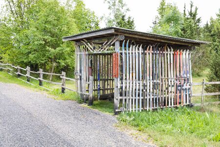 HIIUMAA, ESTONIA - JULY 29, 2018: Resting cabin decorated with old skies in Hiiumaa, Estonia in July 2018のeditorial素材