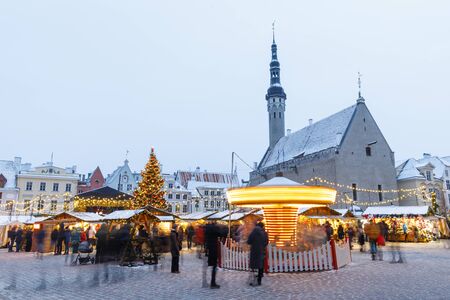 TALLINN, ESTONIA - DECEMBER 22, 2018: People visit christmas market in the old town of Tallinn, capital of Estonia on December 22, 2018のeditorial素材