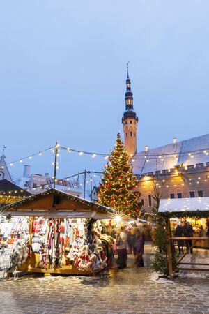 TALLINN, ESTONIA - DECEMBER 22, 2018: People visit christmas market in the old town of Tallinn, capital of Estonia on December 22, 2018のeditorial素材