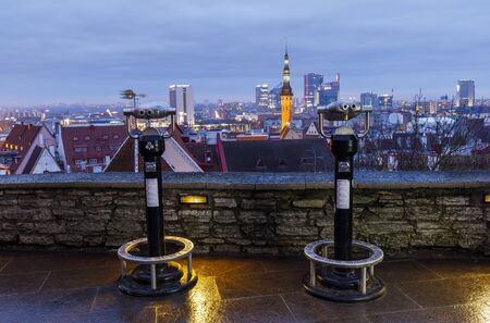 TALLINN, ESTONIA - DECEMBER 23, 2019: Silver colored viewing machine at viewpoint in the old town of Tallinn, Estoniaのeditorial素材