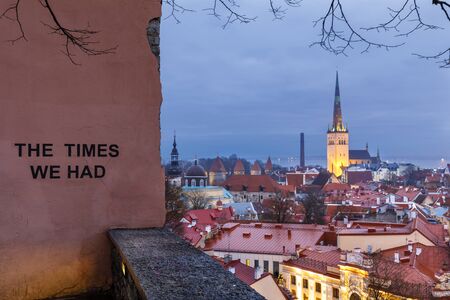 Illuminated church tower in the old town of Tallinn, Estonia at nightのeditorial素材