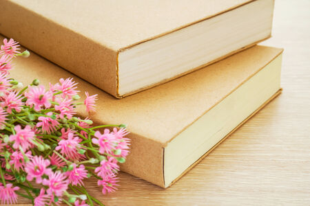 Book and pink flowers