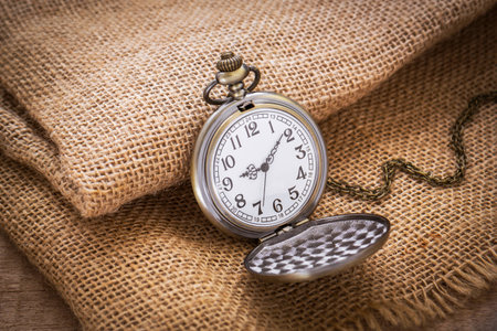 Pocket watch on sackclothの写真素材