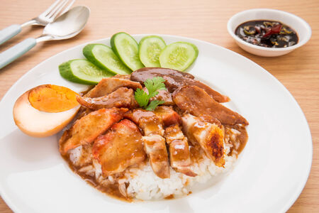 Roasted red pork with sweet gravy and riceの写真素材