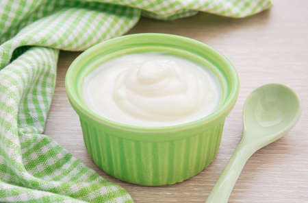 Yogurt in green bowlの写真素材
