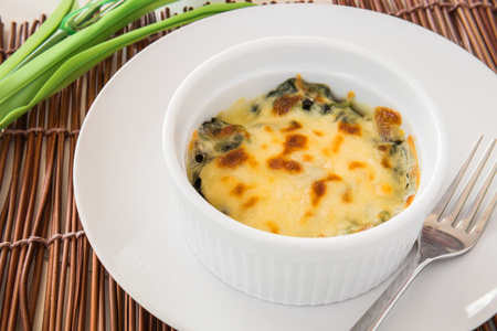 Baked spinach with cheeseの写真素材