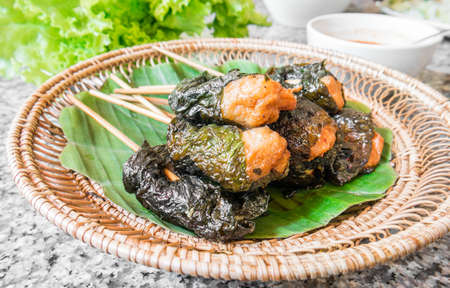 Grilled pork wraps with leaf, Vietnamese cuisineの写真素材
