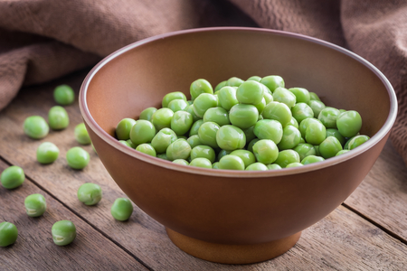 Green peas in bowlの写真素材