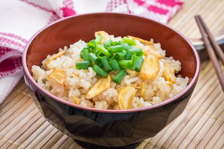 Fried rice with garlic in bowlの写真素材
