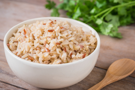 Brown rice in bowlの写真素材
