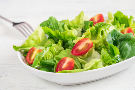 Fresh vegetable salad in bowlの写真素材