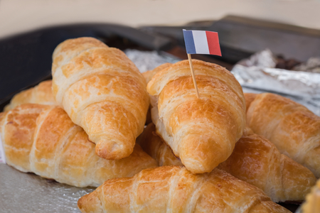 Croissants in pastry shopの写真素材