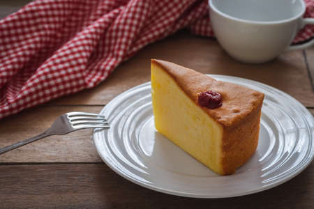 Butter cake sliced on white plate