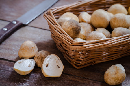Straw mushroom on wooden tableの写真素材
