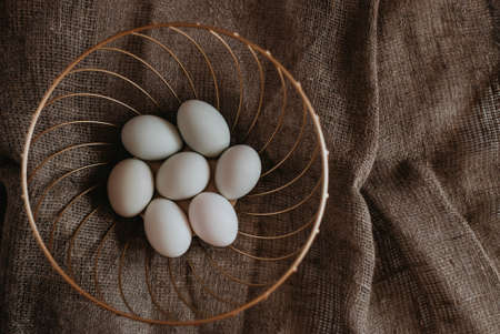Eggs on a dark background. white eggs. Easter day.の写真素材