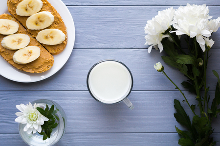 Milk and sandwiches for breakfastの写真素材