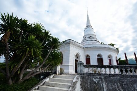 The beautiful white temple in front of the beautiful sea at Sichang island, Thailandの写真素材