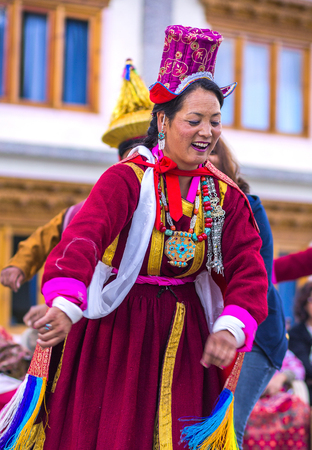 Artists in traditional tibetan costumes performing folk song  in Leh, India.のeditorial素材