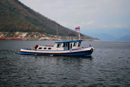Boat for tourist in the dam of northern Thailandの素材