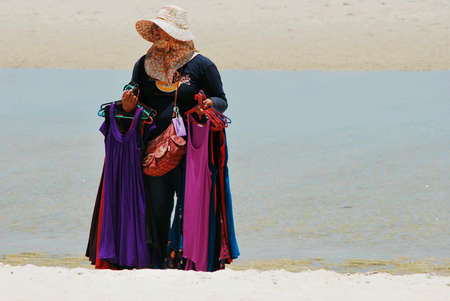 Woman sell cloths on the beach at Huahin Thailand