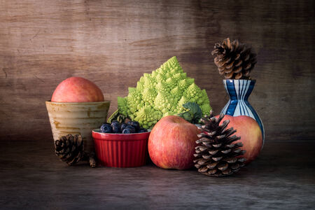 Still life with a cup of fruitの写真素材