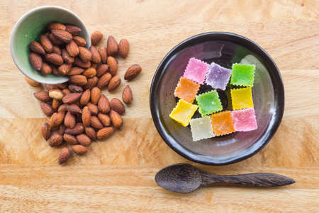 Almonds and colorful dessert for healthyの写真素材